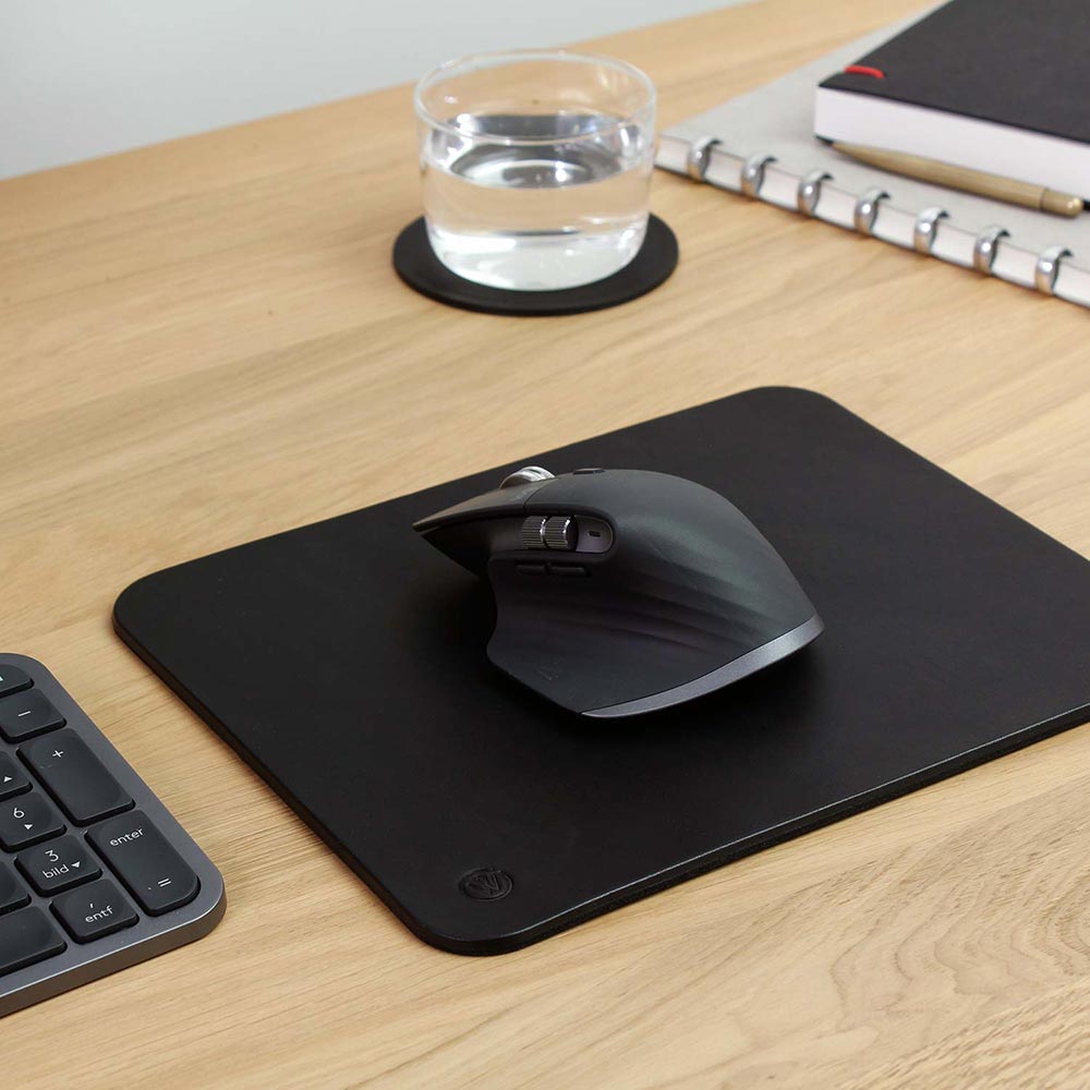 Computer mouse on mousepad OSKAR from Goodwilhelm in the color black on a desk