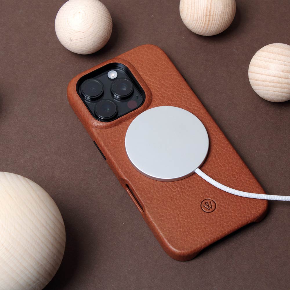 iPhone 16 Pro case made of high-quality cognac brown leather with MagSafe function, in set with brown cardboard box and wooden balls