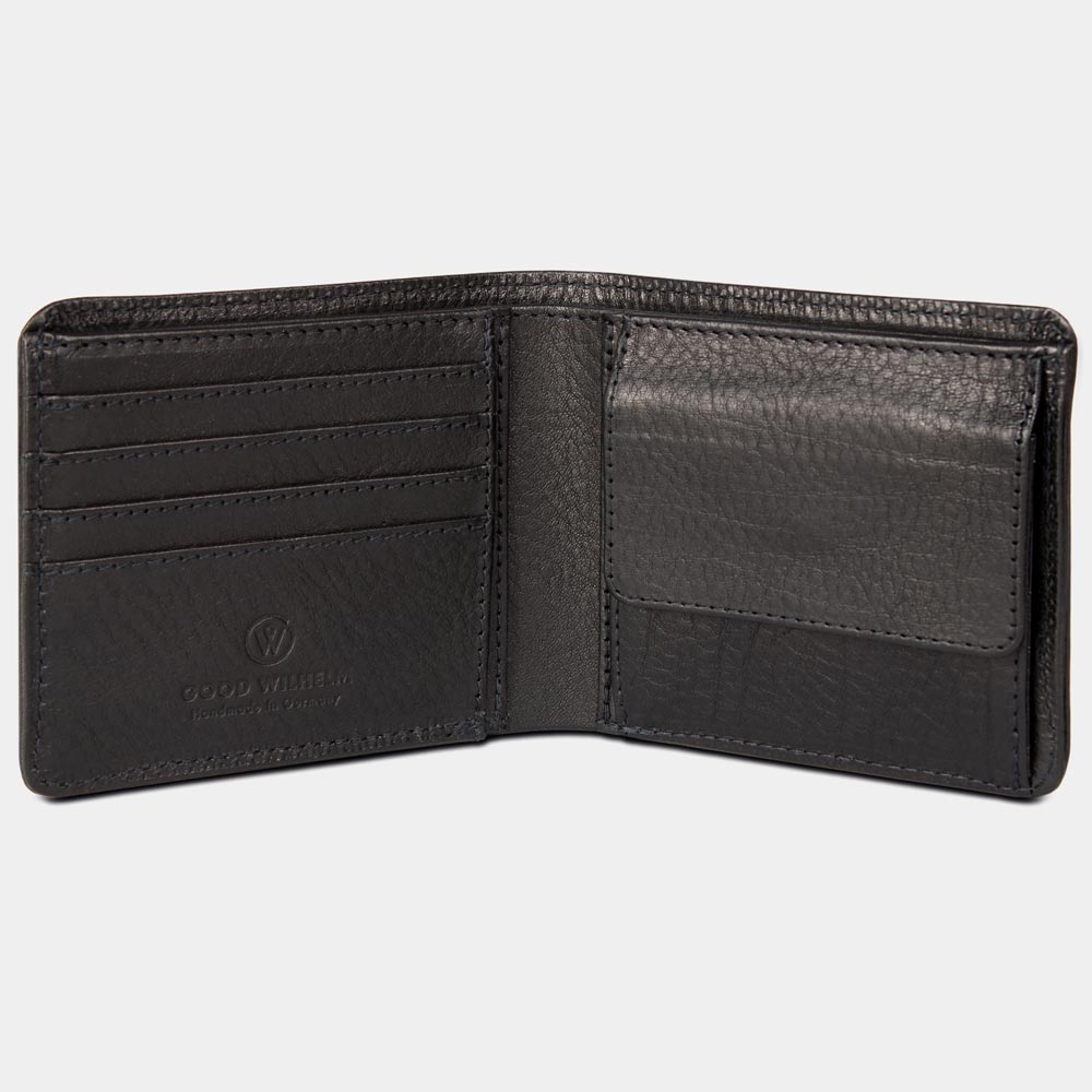 Fold-out wallet made from vegetable-tanned leather in black with card slots on a white background