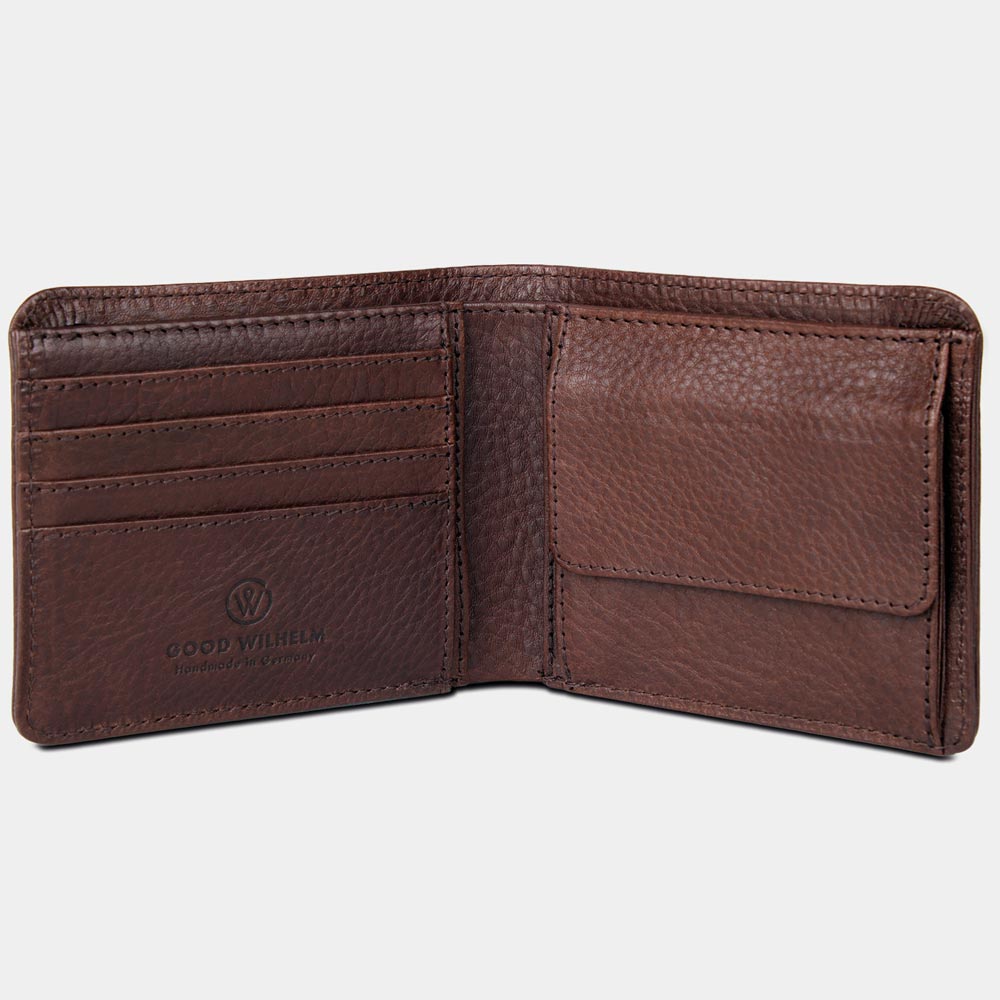 Fold-out wallet made from vegetable-tanned leather in chocolate brown with card slots on a white background