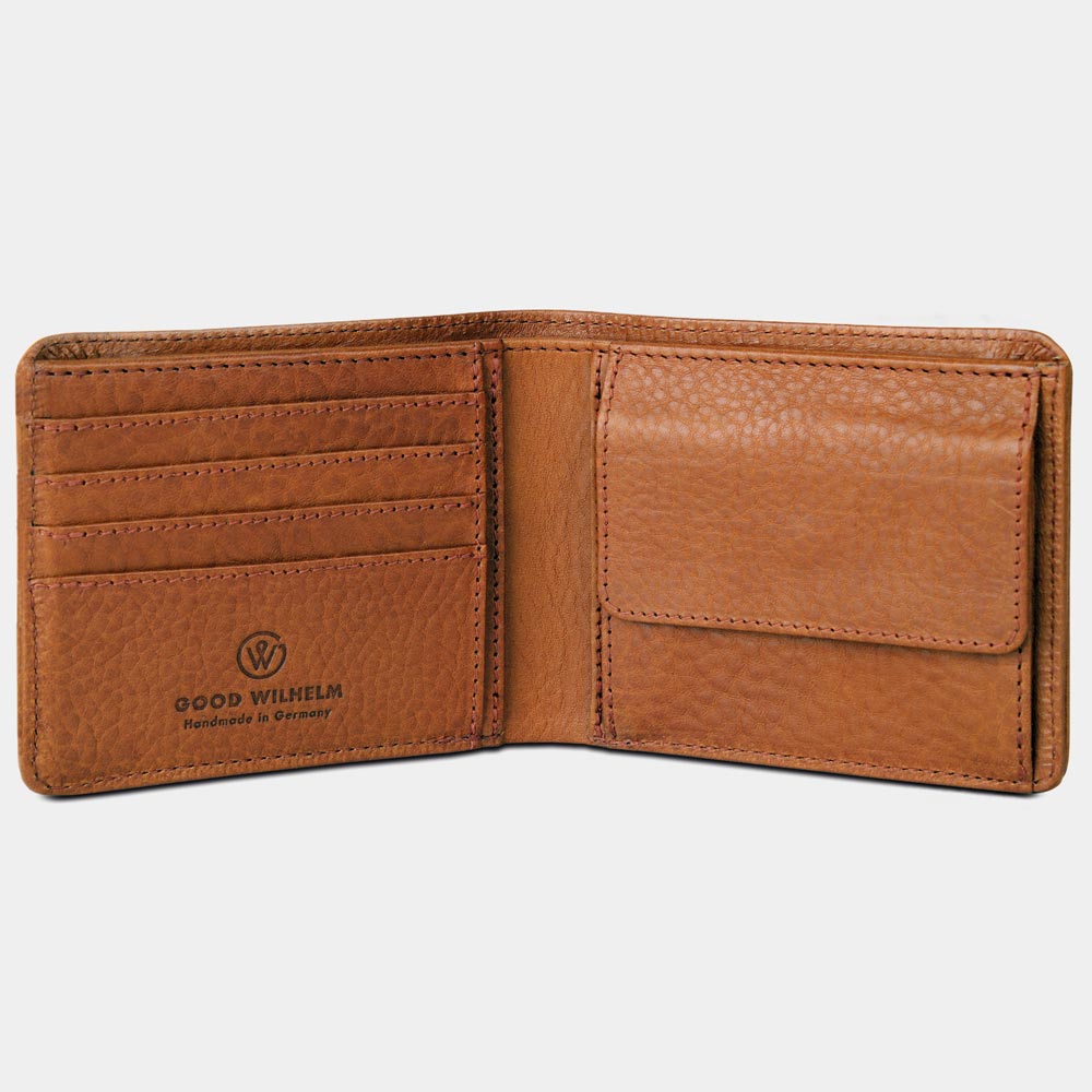 Fold-out wallet made from vegetable-tanned leather in cognac brown with card slots on a white background