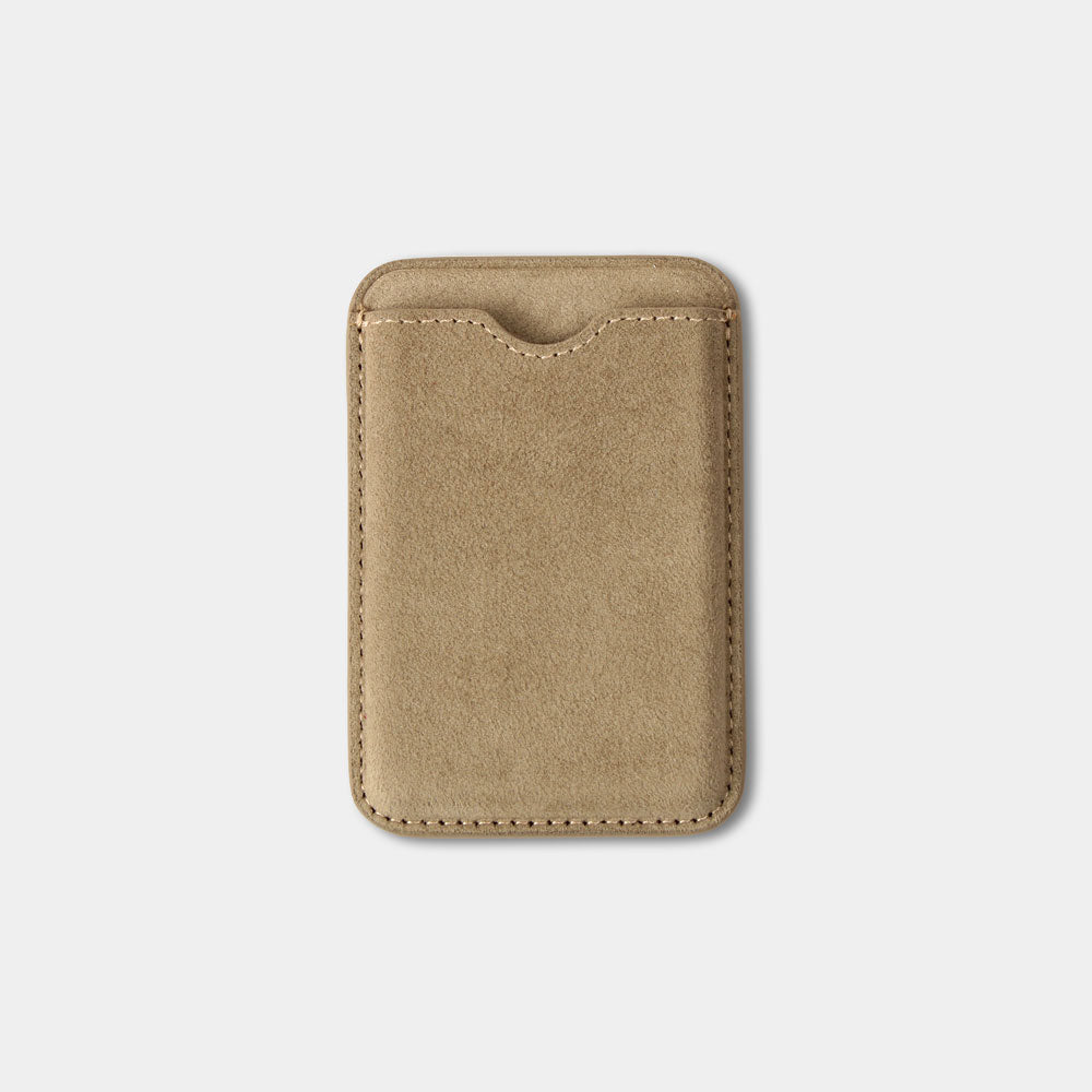 Sand-colored Magsafe wallet for iPhone with thumb cut-out on the front for practical card removal.