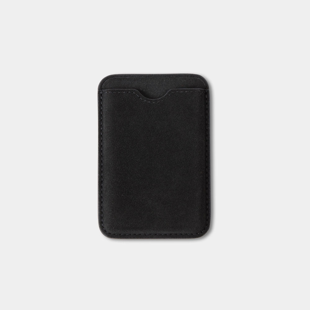 Black Magsafe wallet for iPhone with thumb cut-out on the front for easy card removal.