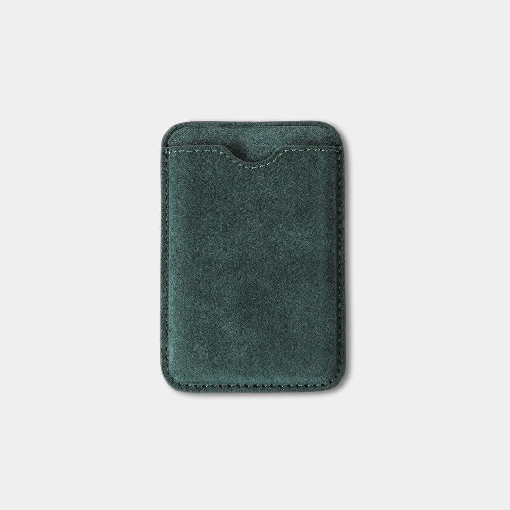 Green Magsafe wallet for iPhone with thumb cut-out on the front, ideal for quick card access.